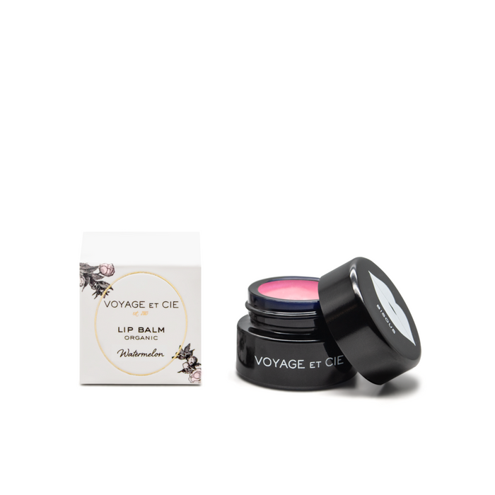 Organic lip balm jar, open lid showing pink balm; Watermelon flavor