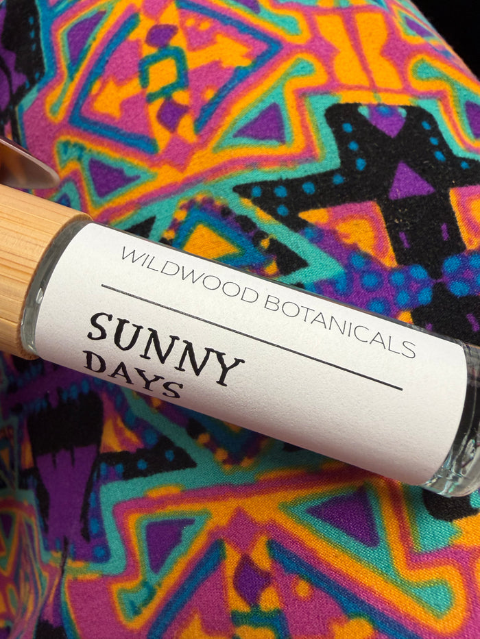 Wildwood Botanicals rollerball perfume bottle with a sleek design, showcasing the compact, portable fragrance for on-the-go use.
