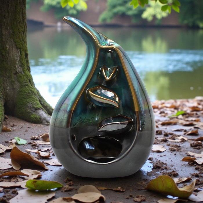 Decorative back flow incense holder  with leaf design by a lake