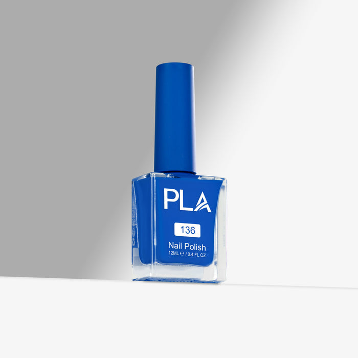 Blue nail polish bottle with 'PLA' branding on a gray background