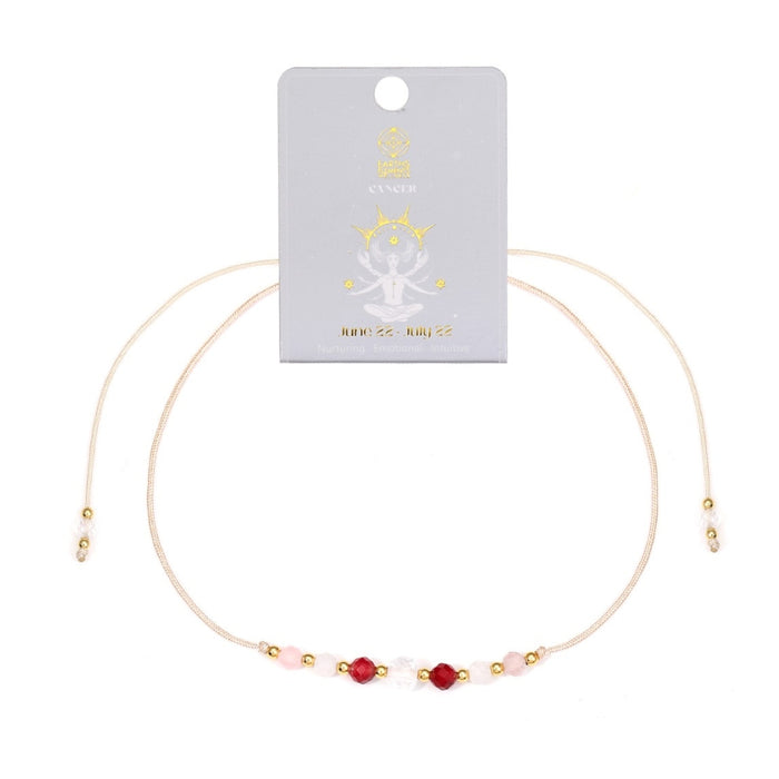 Bracelet - Zodiac, Cancer with red and pink beads on a white background