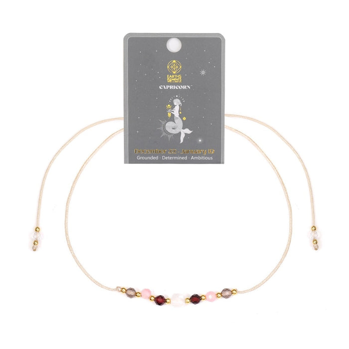 Capricorn Bracelet with small beads on a white background