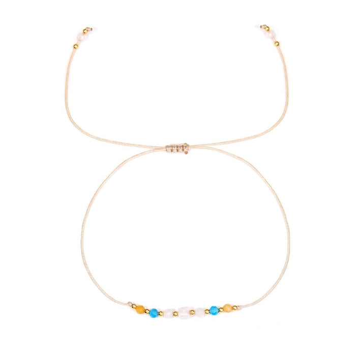 Bracelet - Zodiac, Gemini with small beads on a white background