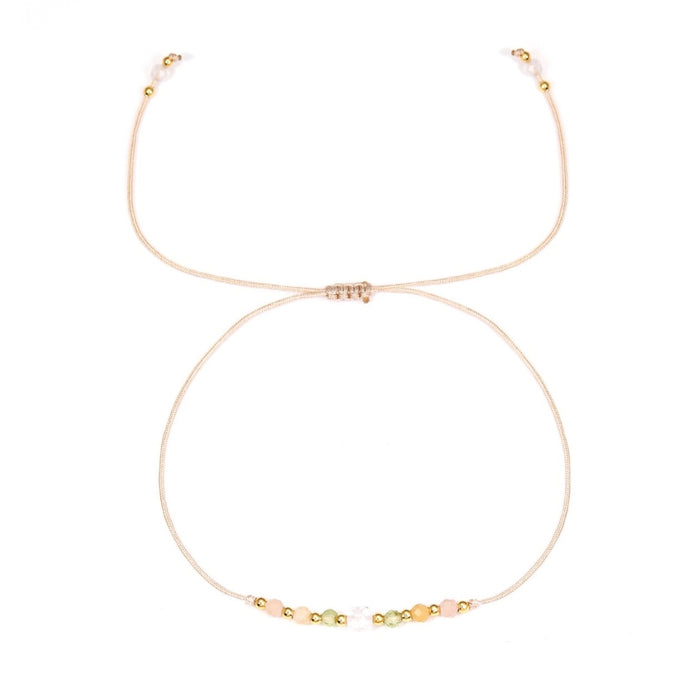 Bracelet - Zodiac, Leo with small beads on a white background