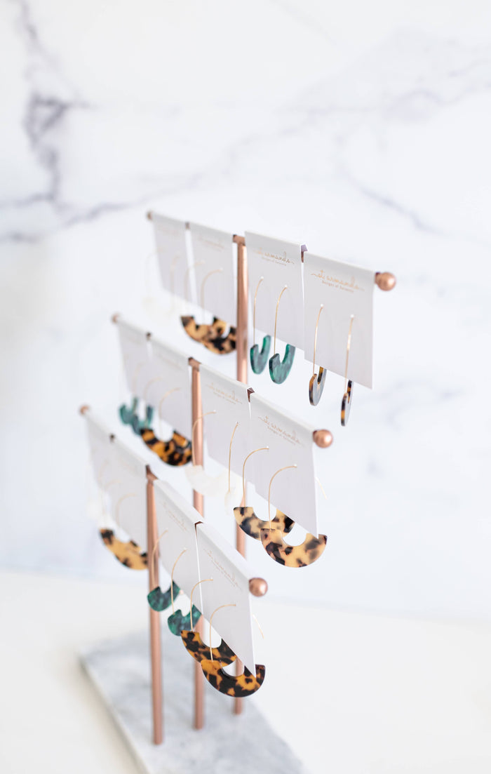 Brown tortoise minimalist threader earrings by St Armands Designs of Sarasota displayed on a white background