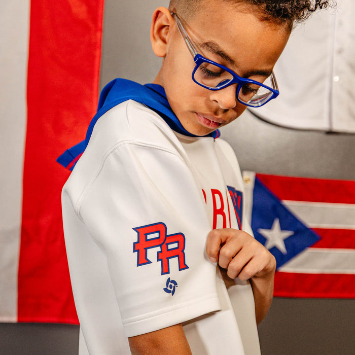 Youth model wearing white BSBL-SZN Puerto Rico youth short sleeve hoodie