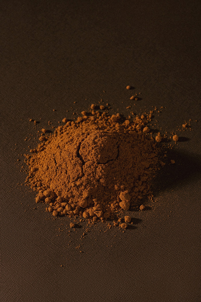 Brown cookie crumbs or spice powder pile