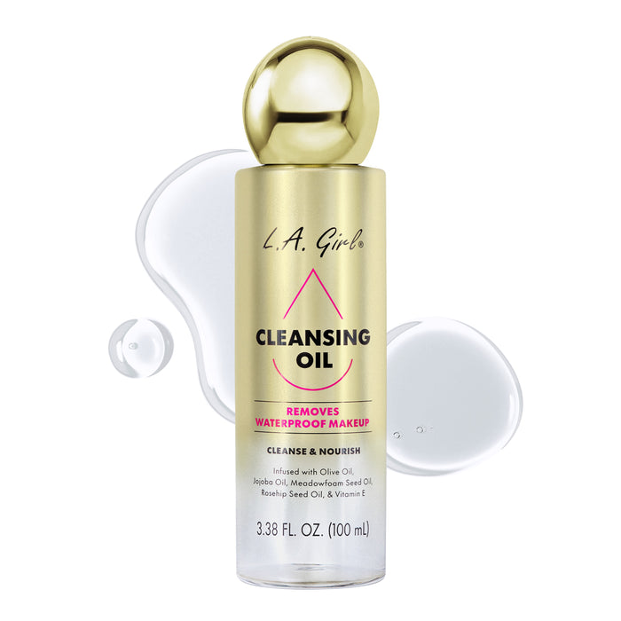 L.A. Girl Cleansing Oil bottle surrounded by clear cleansing oil droplets