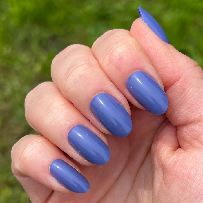 CNH | Oval | Medium medium blue oval press-on nails with a glossy finish for a stylish at-home manicure look