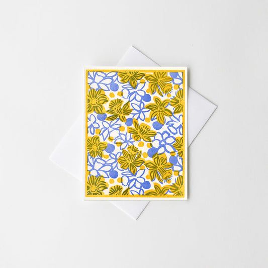 Floral letterpress greeting card with yellow and blue daisy-like flowers