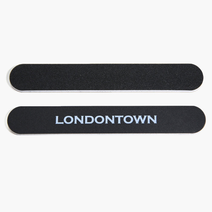 The LONDONTOWN Emery Board Nail File set includes two black, durable emery boards with rounded edges. One board features the brand name "LONDONTOWN" in white capital letters. Perfect for everyday use at home or on the go.
