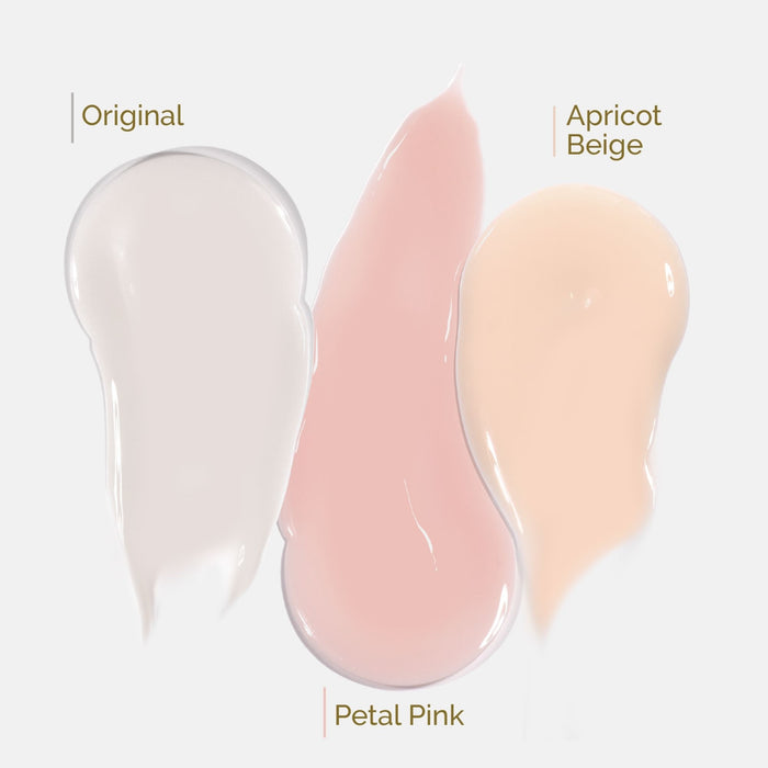Three swatches of LONDONTOWN’s Fortifying Ridge Filler—Original (white), Petal Pink (light pink), and Apricot Beige (peach)—are shown on a light background, highlighting this nail-smoothing ridge filler.