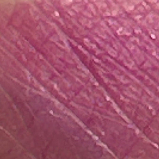 Ghost Orchid frosted lipstick swatch on skin in cool pink orchid shade