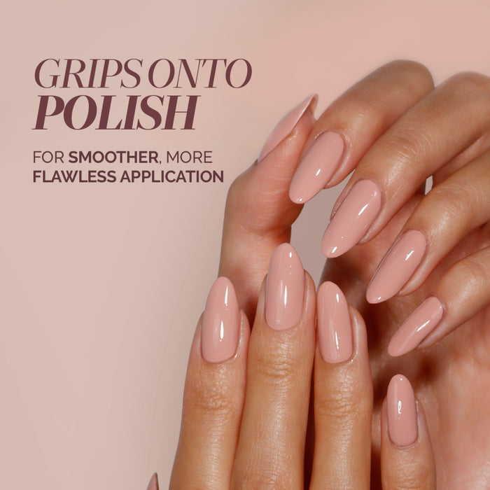 Showcase well-manicured hands with glossy nude pink nails, highlighting LONDONTOWN's Gel Genius Base Coat for smoother, more flawless nail polish application thanks to its nourishing primer formula.