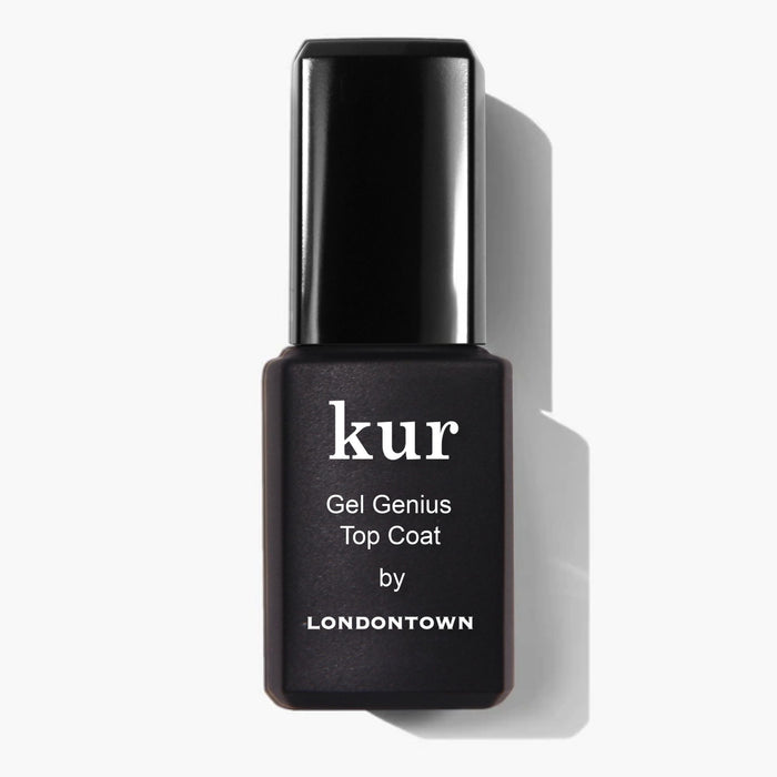 LONDONTOWN’s Gel Genius Top Coat, shown in a sleek black bottle, is a best-seller that delivers a long-lasting, gel-like mani—set against a crisp white backdrop.