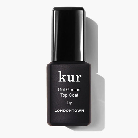 LONDONTOWN’s Gel Genius Top Coat, shown in a sleek black bottle, is a best-seller that delivers a long-lasting, gel-like mani—set against a crisp white backdrop.