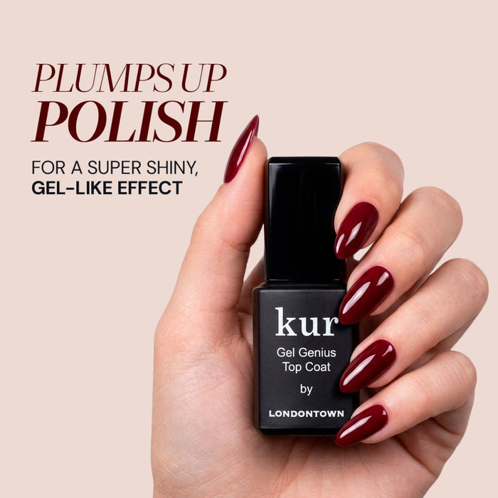 A hand with long, dark red manicured nails holds LONDONTOWN’s Gel Genius Top Coat, showcasing a super shiny, gel-like manicure effect.