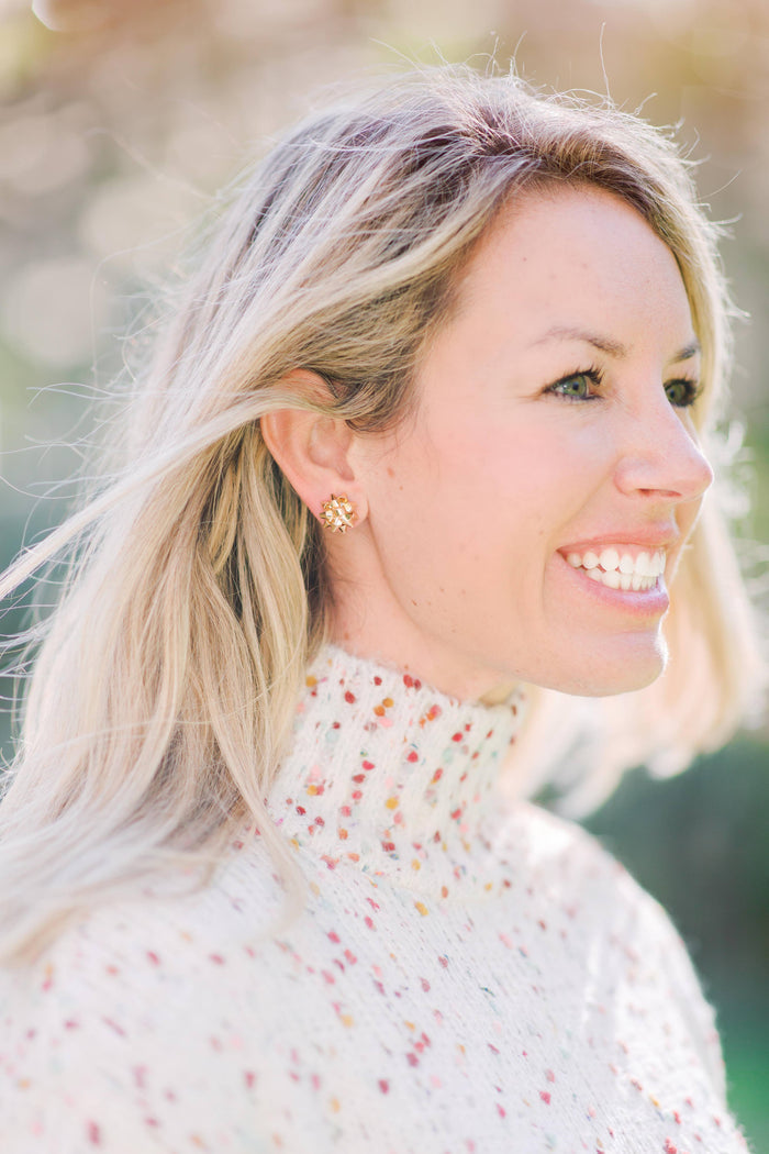 Gold Present Bow Earrings by St Armands Designs of Sarasota, stylish jewelry featuring gold bow-shaped earrings.