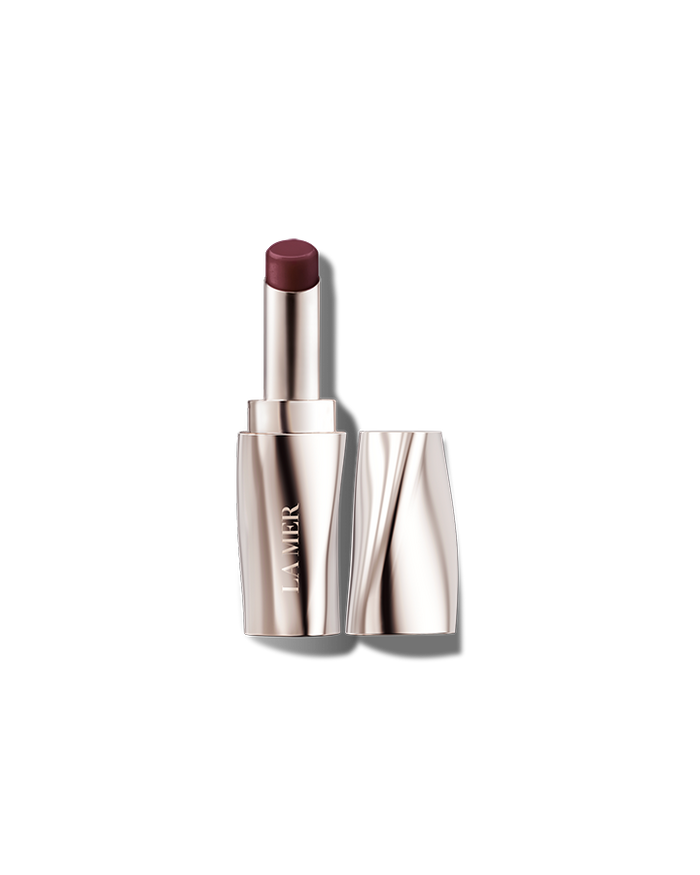 La Mer The Lip Treatment in various shades, new in box, showcasing the sleek packaging and diverse color options.