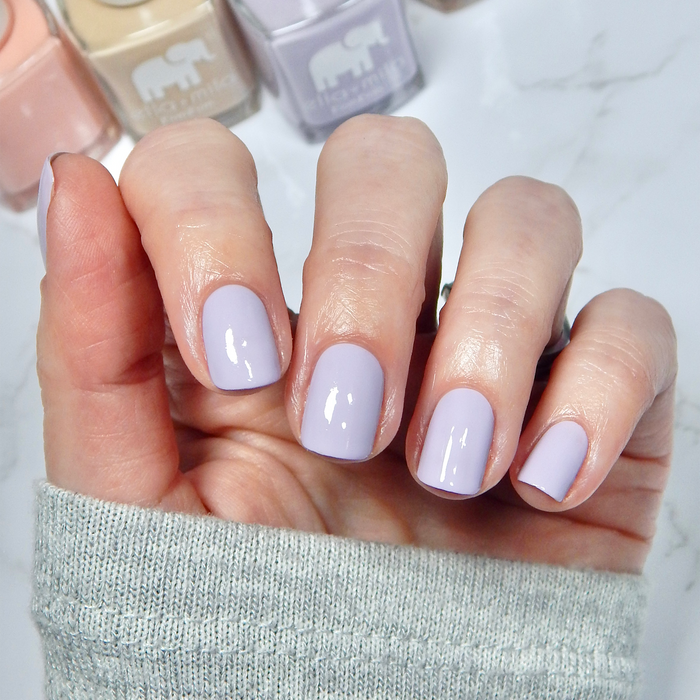 Lavender Drop lavender with pastel blue, peach and cream mix-and-match manicure