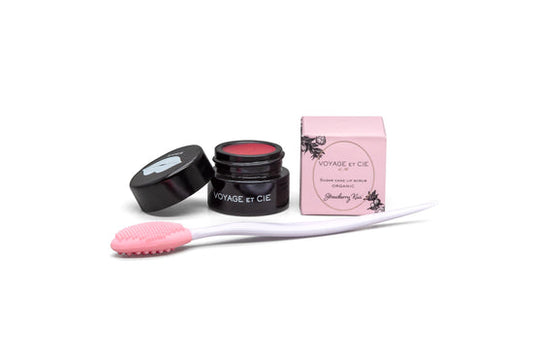 Strawberry sugar lip scrub set with pink jar, black lid, applicator brush, and pink pouch