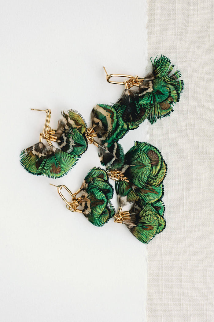 Mallard feather tassel earrings with gold accents, featuring natural feather details and elegant dangle design by St Armands Designs of Sarasota
