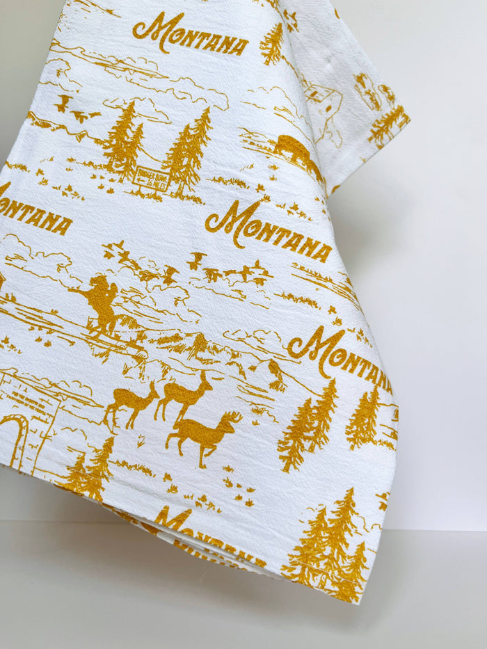 Montana Scenes cotton kitchen towel featuring scenic landscape print, durable and absorbent, by The Coin Laundry.