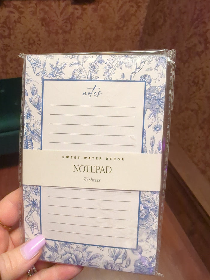 Sweet Water Decor notepad with floral design, featuring lined pages for journaling or note-taking.