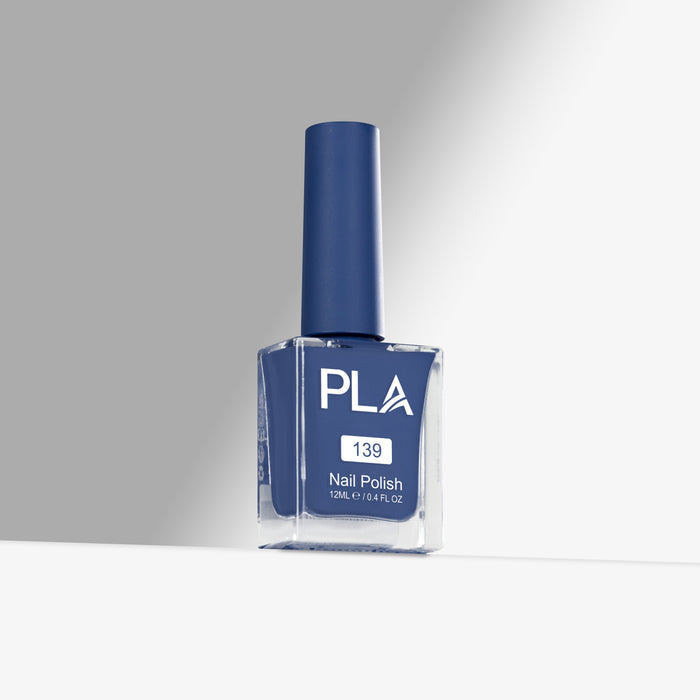 Blue nail polish bottle with 'PLA' branding on a gray background