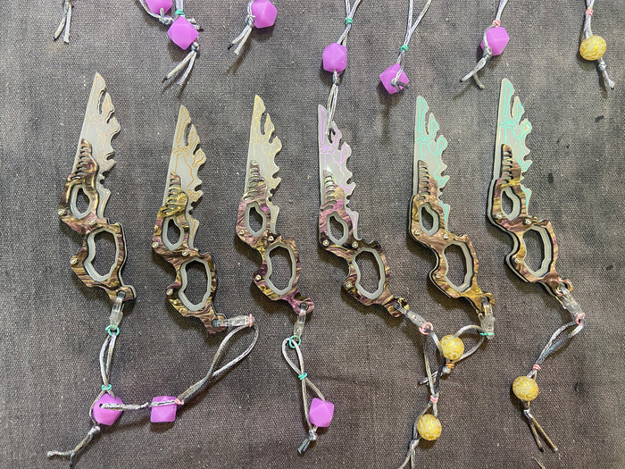 **PATREON EXCLUSIVE** SPACE FLAP ( SEPIOID ALIEN ) GALACTIC FEATHER GLOW CHARM