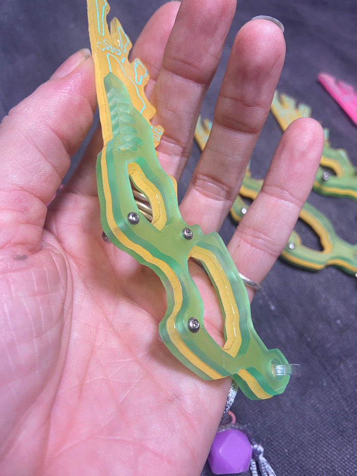 **PATREON EXCLUSIVE** SPACE FLAP ( SEPIOID ALIEN ) GALACTIC FEATHER GLOW CHARM