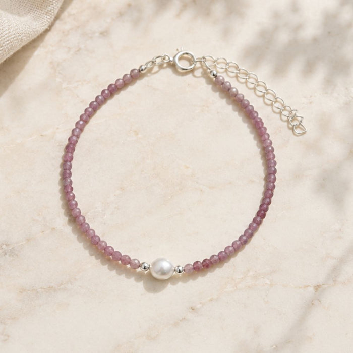 Pink Tourmaline bracelet with freshwater pearl accent.