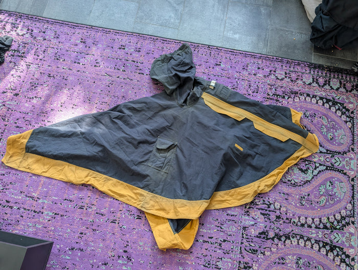 PONCHO/ CASE PURSE- NEOTROPOLIS DELIVERY OPTIONAL!