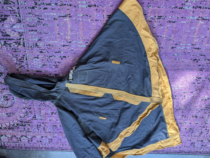 PONCHO/ CASE PURSE- NEOTROPOLIS DELIVERY OPTIONAL!