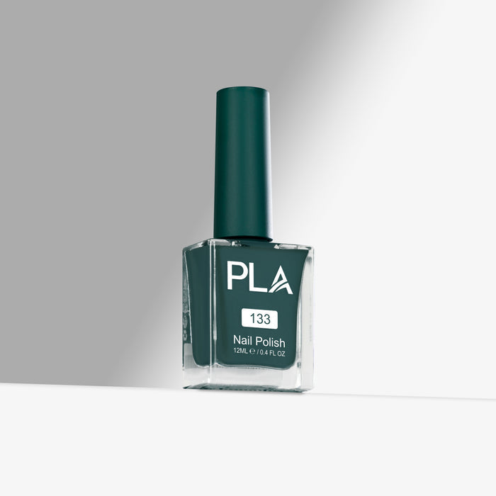 Green nail polish bottle with 'PLA' branding on a gray background