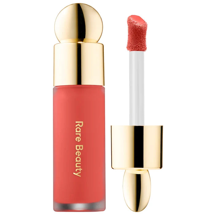Rare Beauty by Selena Gomez Soft Pinch Liquid Blush in NWOB, featuring the product's sleek packaging and soft pink shade.