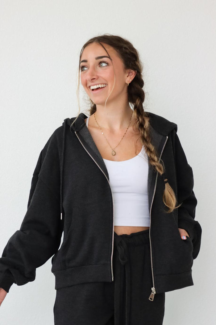 girl wearing dark gray hoodie