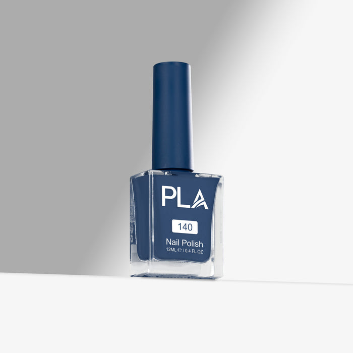 Blue nail polish bottle with 'PLA' branding on a gray background