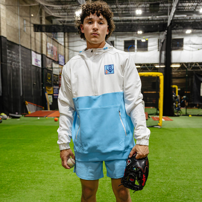 Adult model wearing multi-color hoodie with "UVChangeup Trash Talk" design