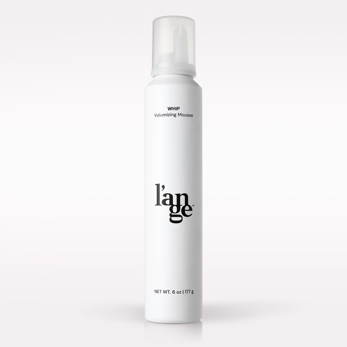 L’ange Whip Volumizing Mousse on a blank background